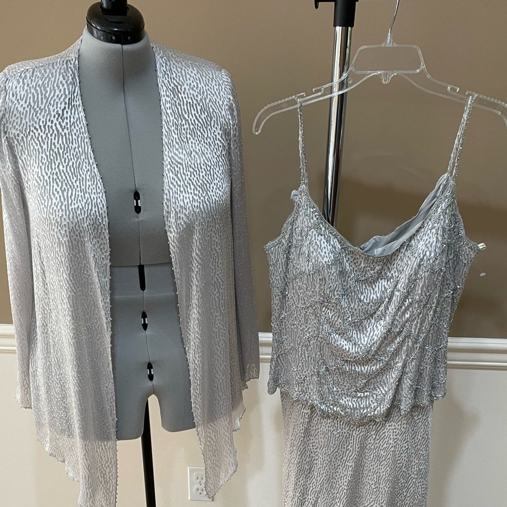 Montage evening gown in silver burn-out silky fabric